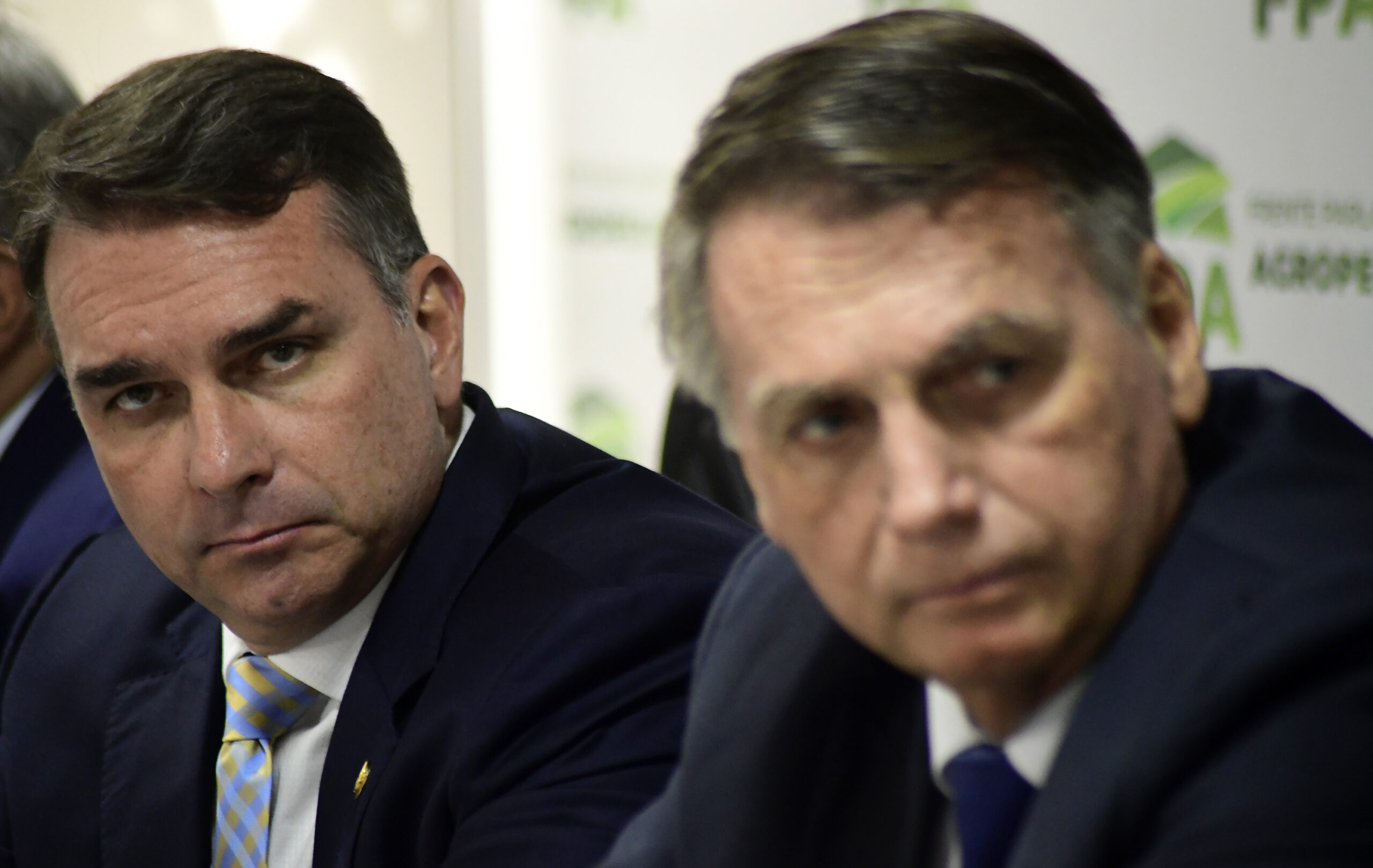 bolsonaro recorded trying to shield son from investigation