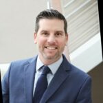 ainsworth appoints ryan comstock as permanent ceo